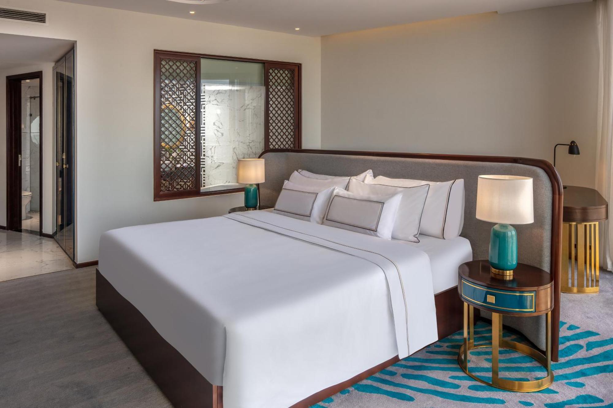Hotel Melia Vinpearl Hue Pokoj fotografie A bedroom at the hotel